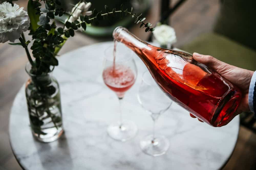 rose wine being poured